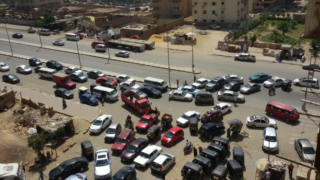 Unregulated traffic flow at intersection on al-Sha`rawi st. (Photo: Heba Mannoun, used with permission)