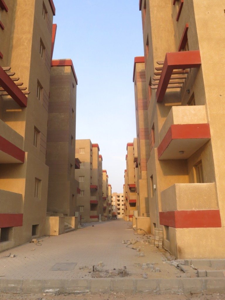 Pedestrian passages between the buildings of the new residential project, the final finishing work is nearing completion. (Tadamun, 2015)